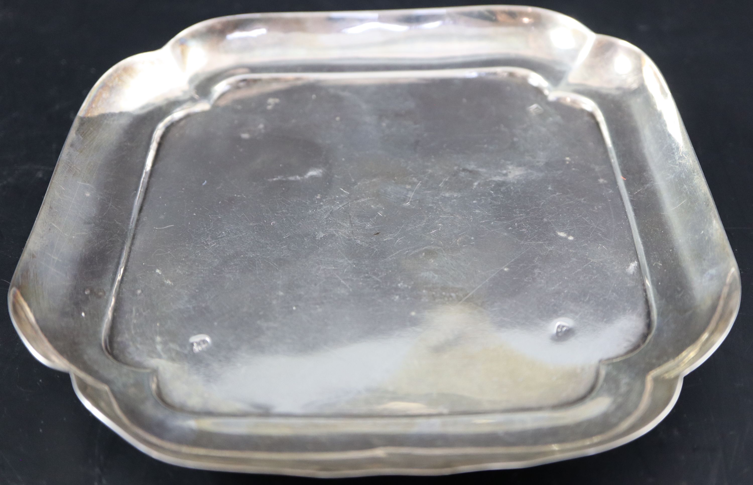 A George III silver shaped square waiter or stand, 14.7cm, 5oz.